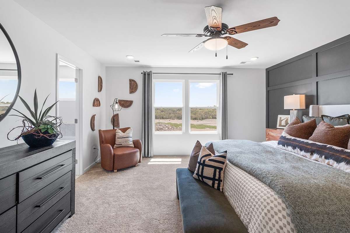 This is a photo of one of our model homes. Please know that some of the exterior and interior finishes, paint, and features may vary.