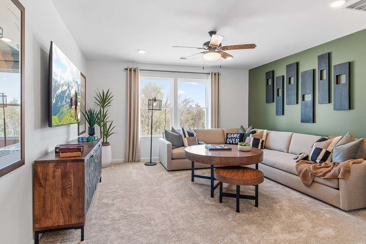 This is a photo of one of our model homes. Please know that some of the exterior and interior finishes, paint, and features may vary.
