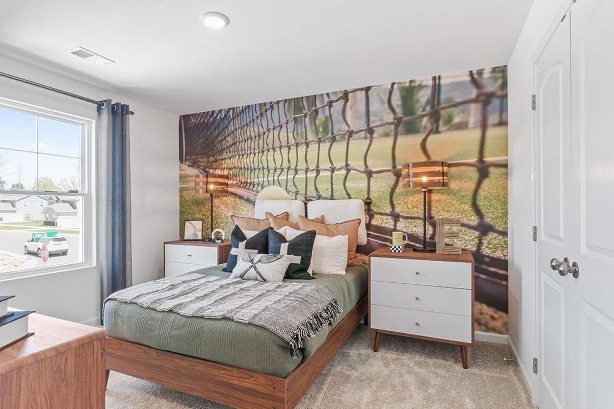 This is a photo of one of our model homes. Please know that some of the exterior and interior finishes, paint, and features may vary.