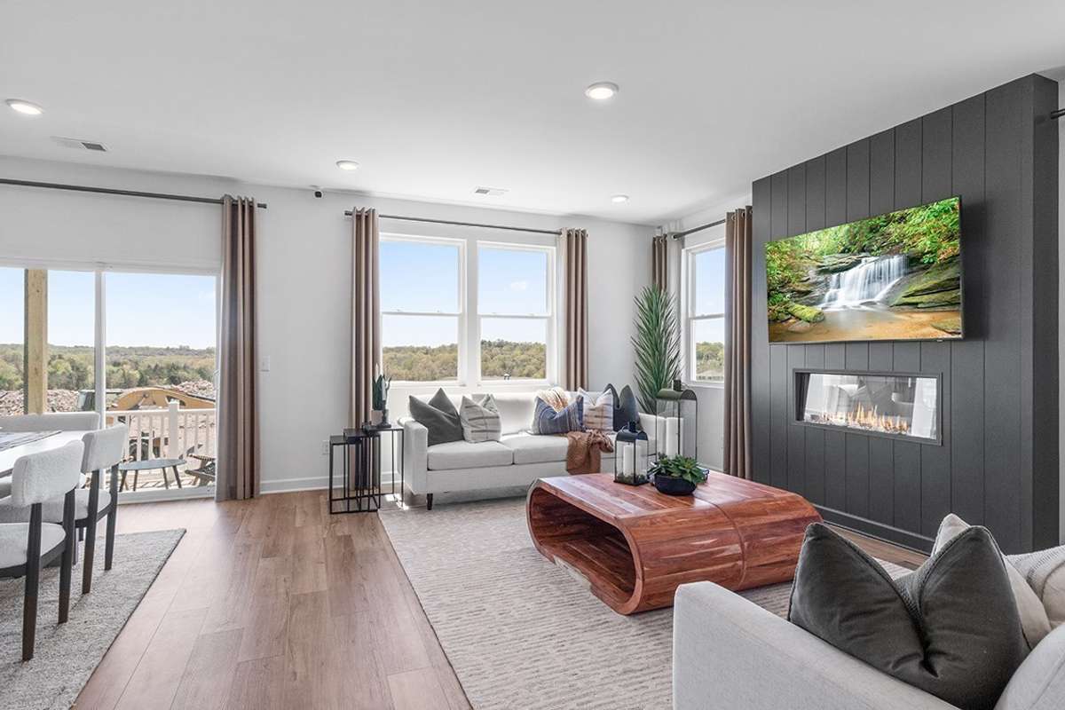 This is a photo of one of our model homes. Please know that some of the exterior and interior finishes, paint, and features may vary.
