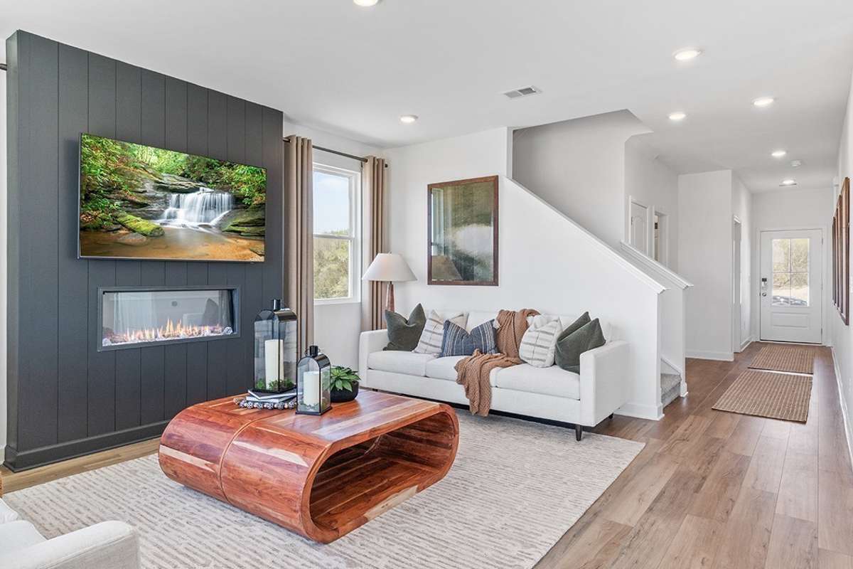 This is a photo of one of our model homes. Please know that some of the exterior and interior finishes, paint, and features may vary.