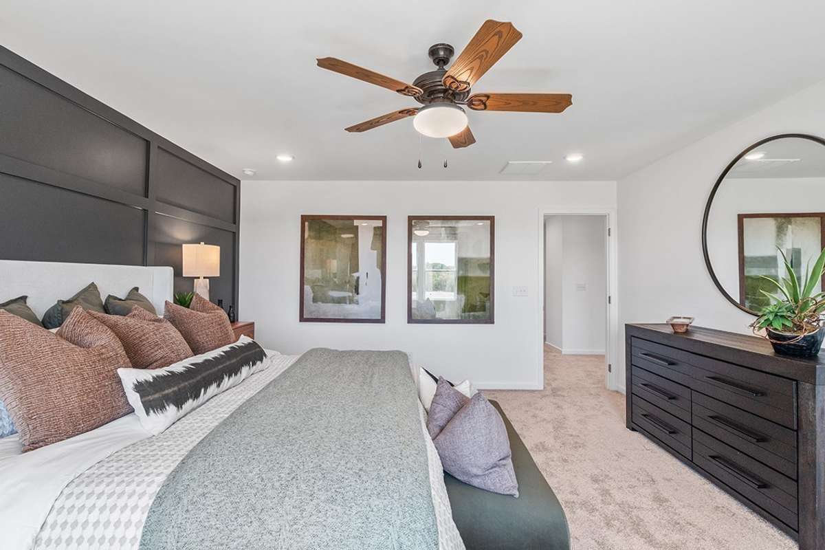 This is a photo of one of our model homes. Please know that some of the exterior and interior finishes, paint, and features may vary.