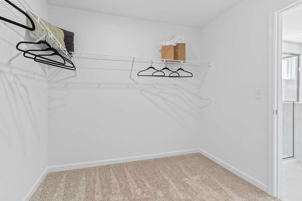 This is a photo of one of our model homes. Please know that some of the exterior and interior finishes, paint, and features may vary.