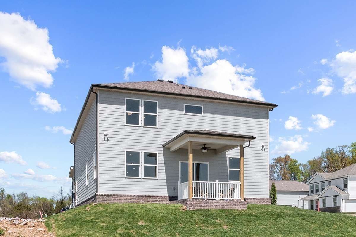 This is a photo of one of our model homes. Please know that some of the exterior and interior finishes, paint, and features may vary.