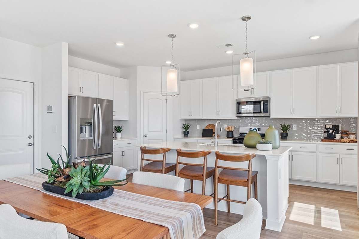 This is a photo of one of our model homes. Please know that some of the exterior and interior finishes, paint, and features may vary.