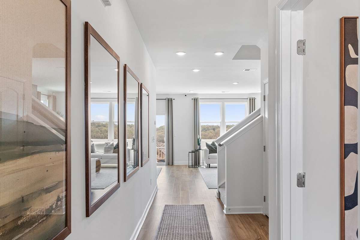 This is a photo of one of our model homes. Please know that some of the exterior and interior finishes, paint, and features may vary.