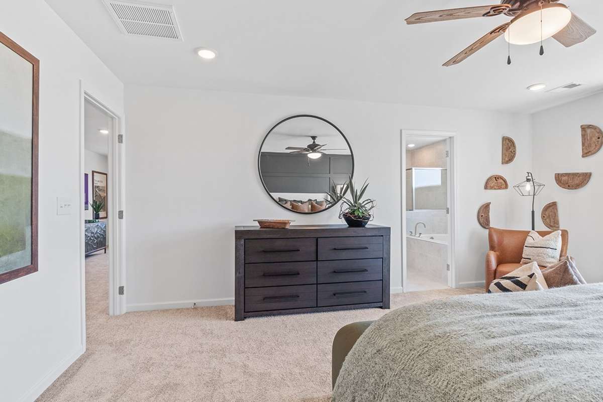 This is a photo of one of our model homes. Please know that some of the exterior and interior finishes, paint, and features may vary.