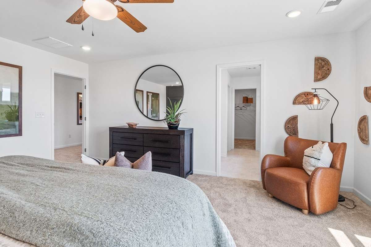 This is a photo of one of our model homes. Please know that some of the exterior and interior finishes, paint, and features may vary.