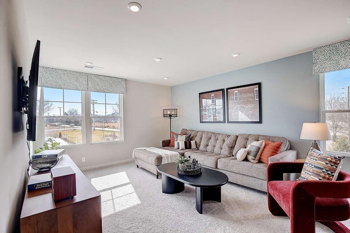 This is a photo of one of our model homes. Please know that some of the exterior and interior finishes, paint, and features may vary.