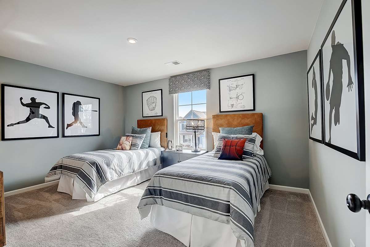 This is a photo of one of our model homes. Please know that some of the exterior and interior finishes, paint, and features may vary.