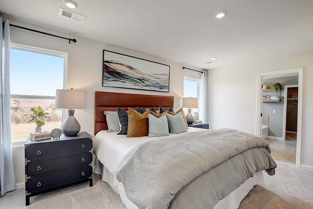 This is a photo of one of our model homes. Please know that some of the exterior and interior finishes, paint, and features may vary.