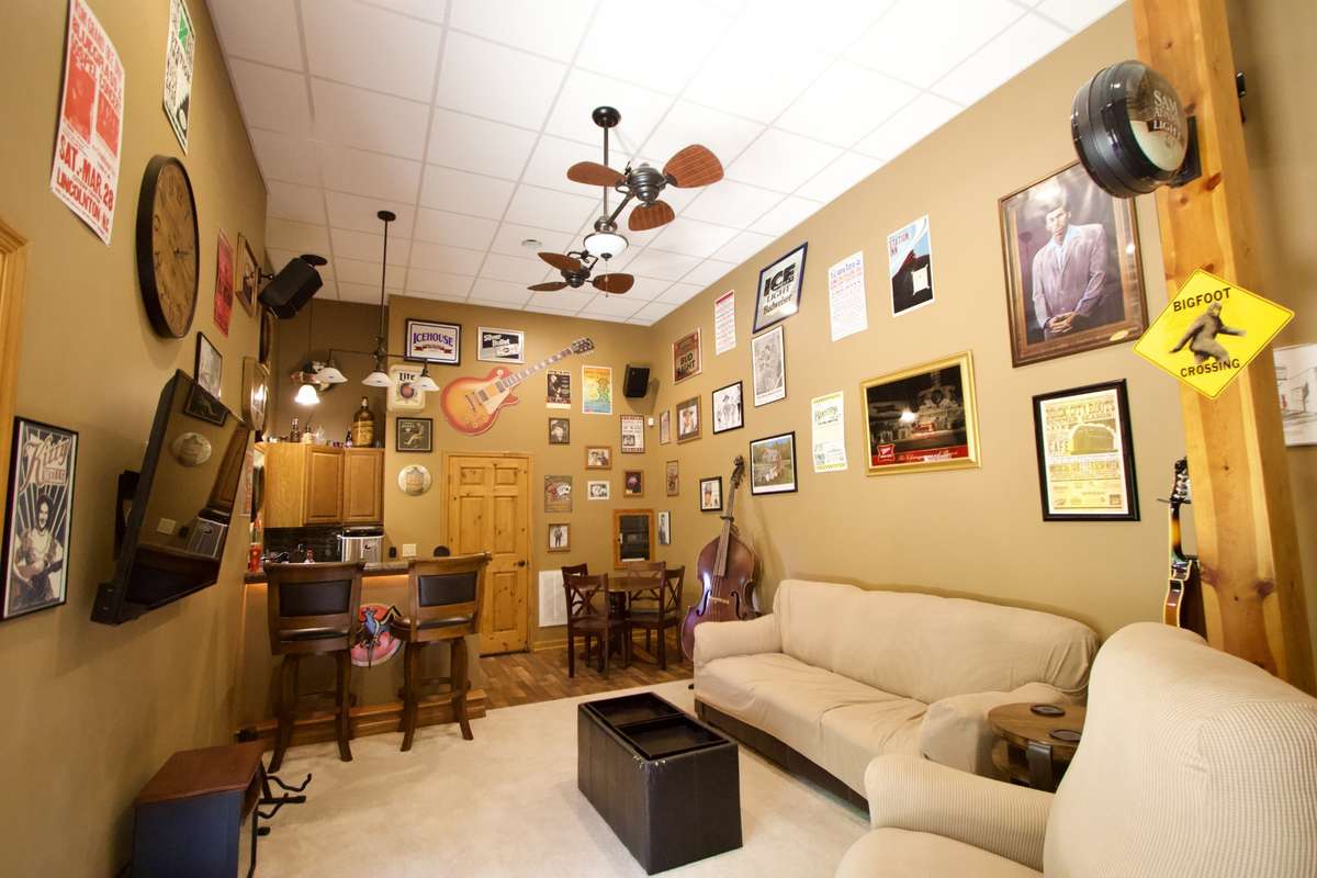 Lower level bar/media room. Full of fun and laughter. Very quiet and away from rest of home. Has a lower level private deck as well.