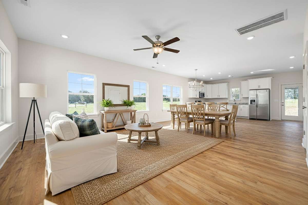 Virtually staged living area of same plan