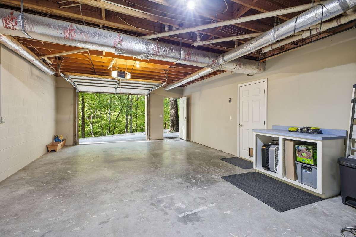 Large deep garage. You can park 2 cars tandem.  There is also one space that is covered outside.