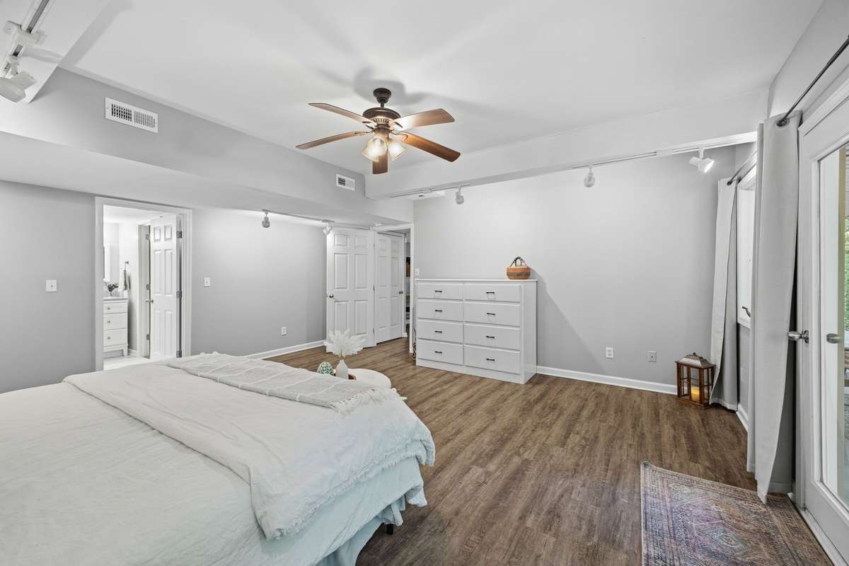 Bedroom #3 is located downstairs and also has French doors that open to the patio.