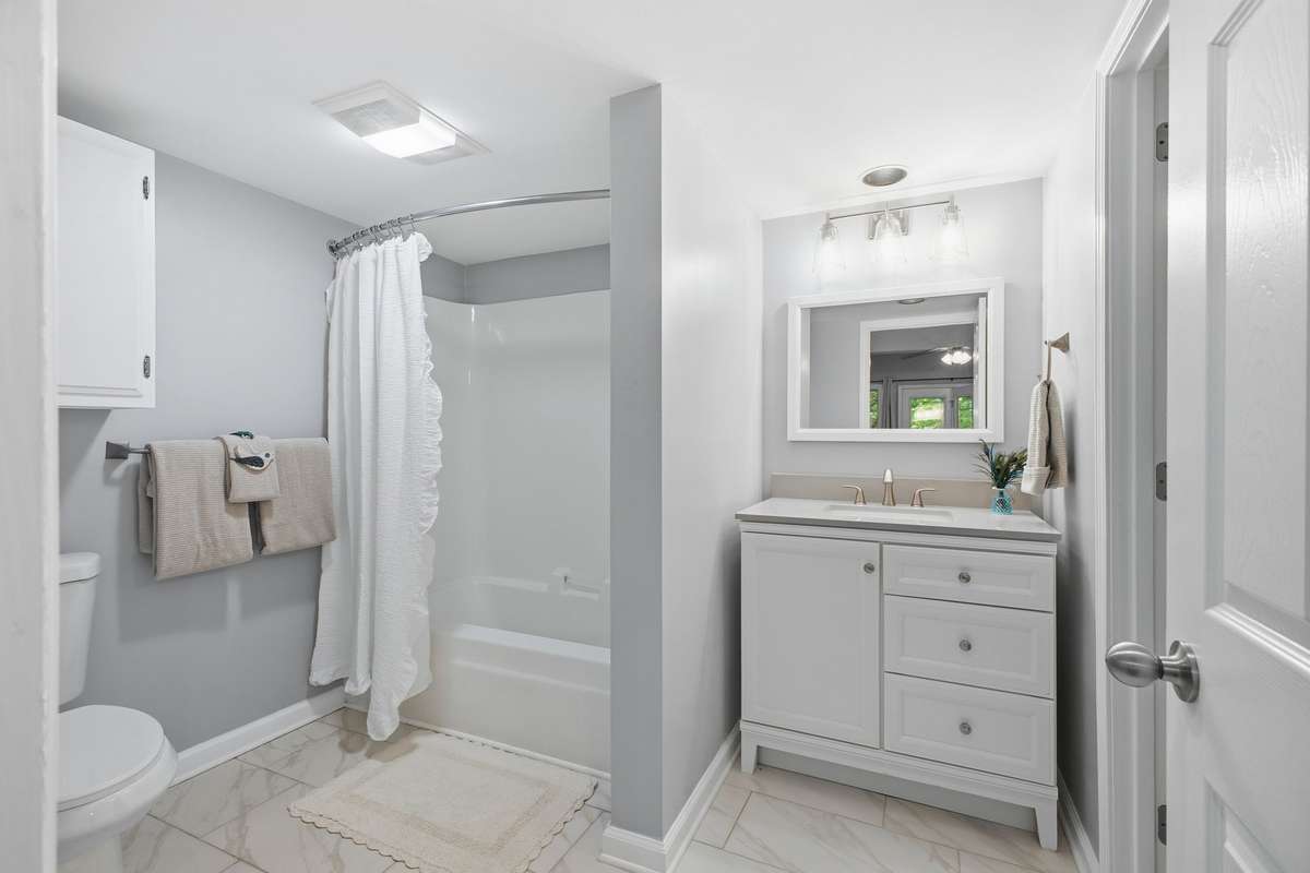 Downstairs full bathroom with tub/shower combo