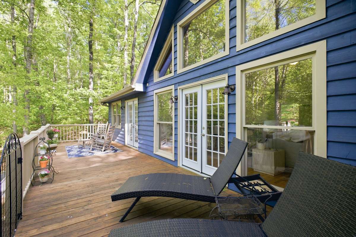 The expansive back porch is for nature lovers!  It receives sun almost all day so you can grow your patio tomatoes and herbs.