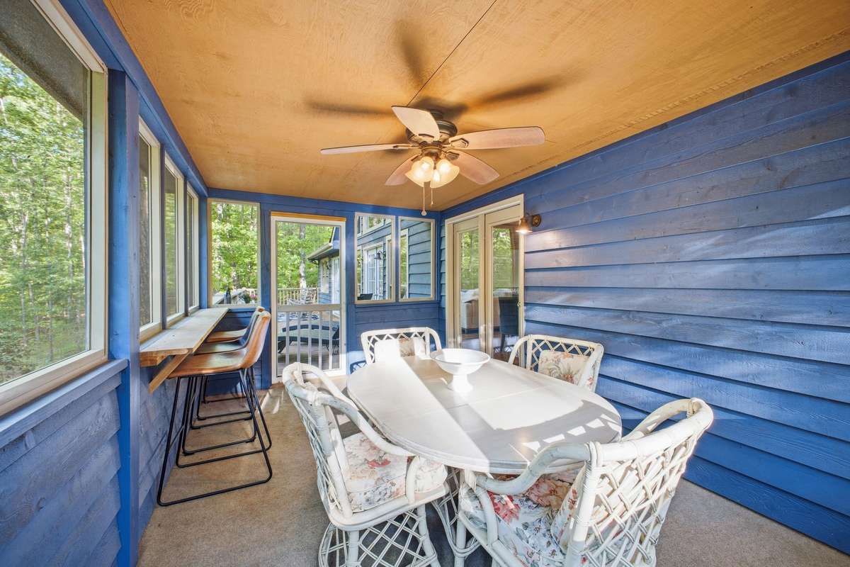 Screened in sunporch for dining or resting!