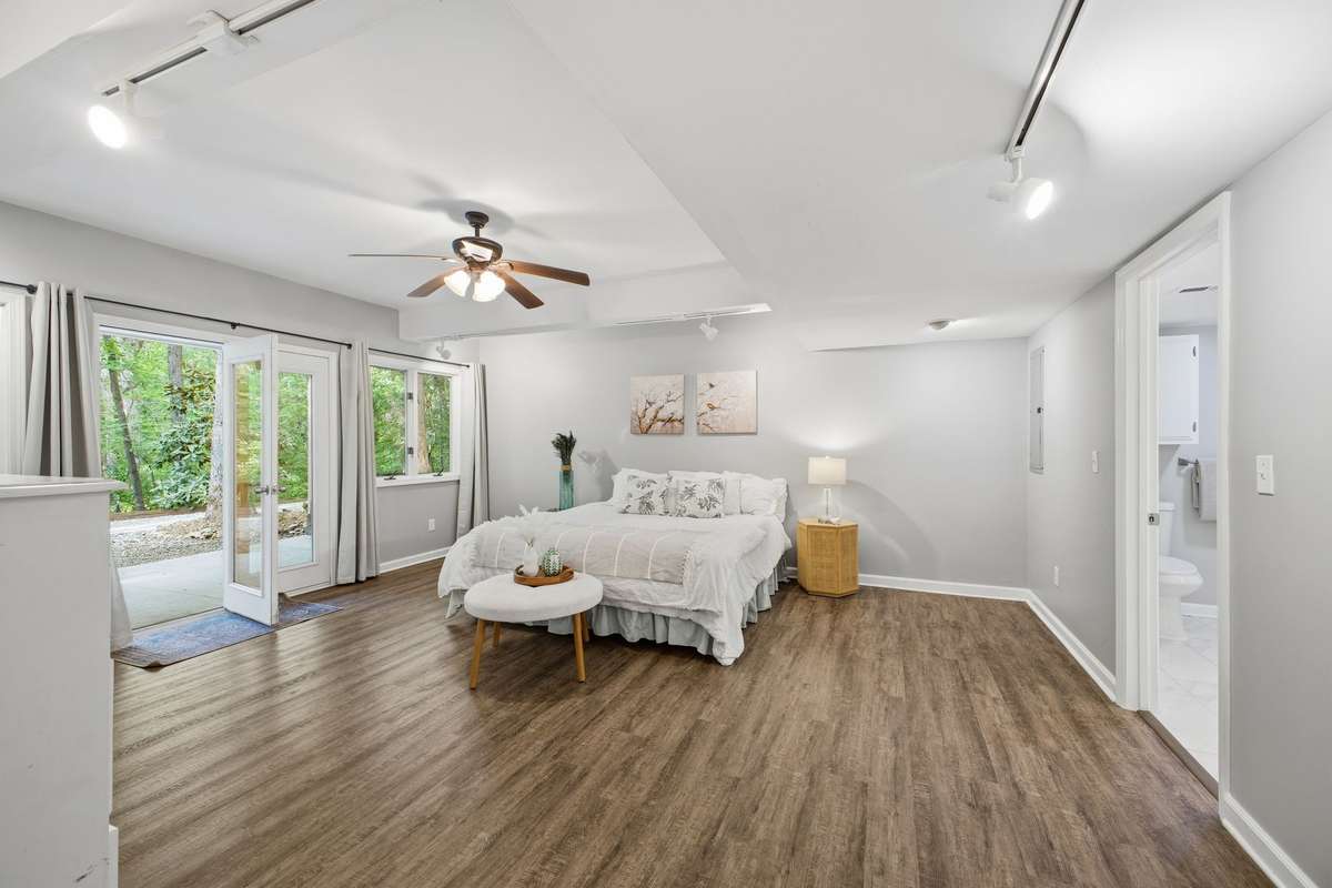 Bedroom #3 is located downstairs and also has French doors that open to the patio.
