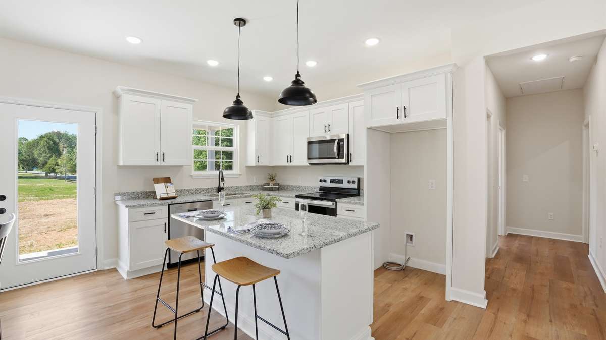 Kitchen w/ granite countertops