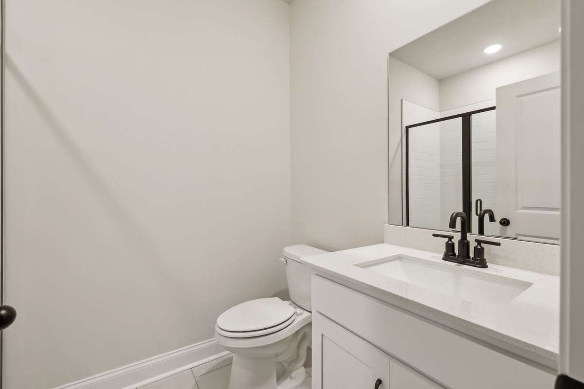 A full bathroom is located on the 1st floor, providing flexibility for overnight guests and family.