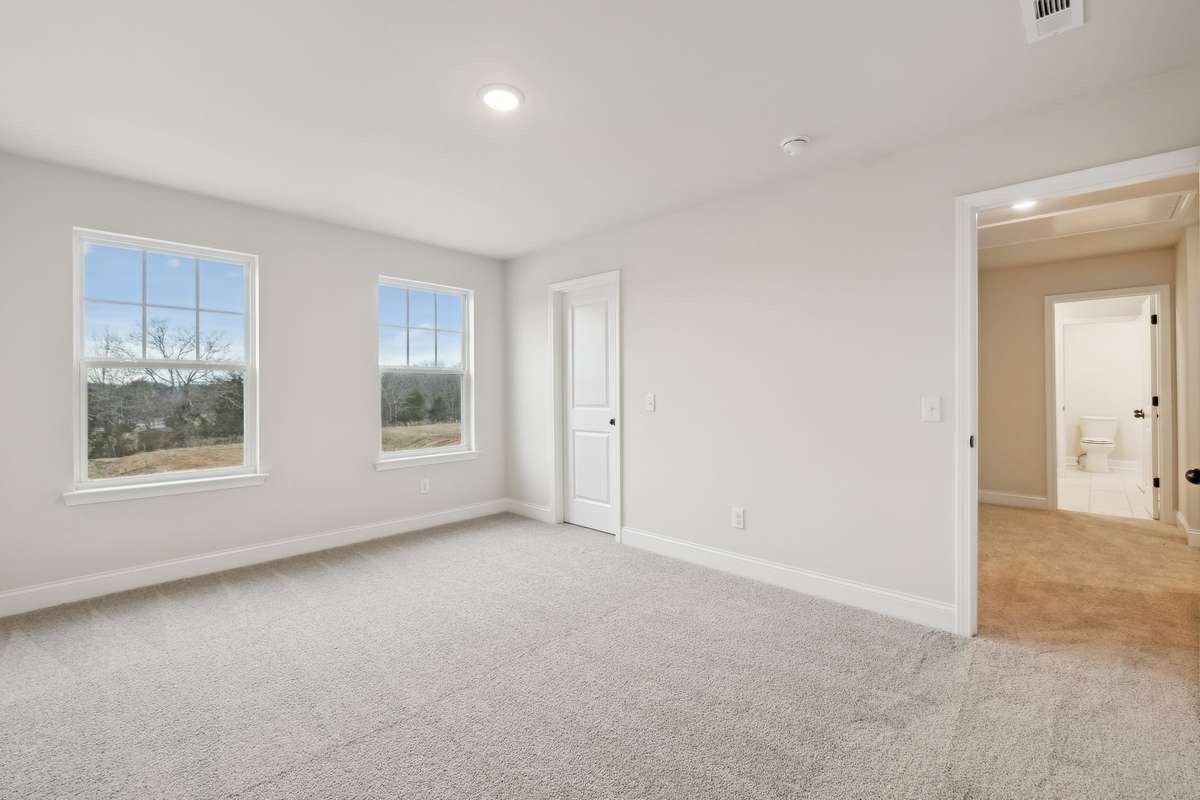 Bedroom #3 measures 15' x 11' and features a large walk-in closet, perfect for extra storage or organization.