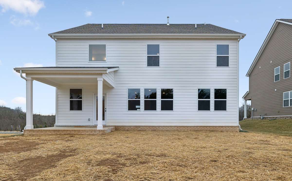This home features a large backyard, providing plenty of open space for play or future outdoor additions.