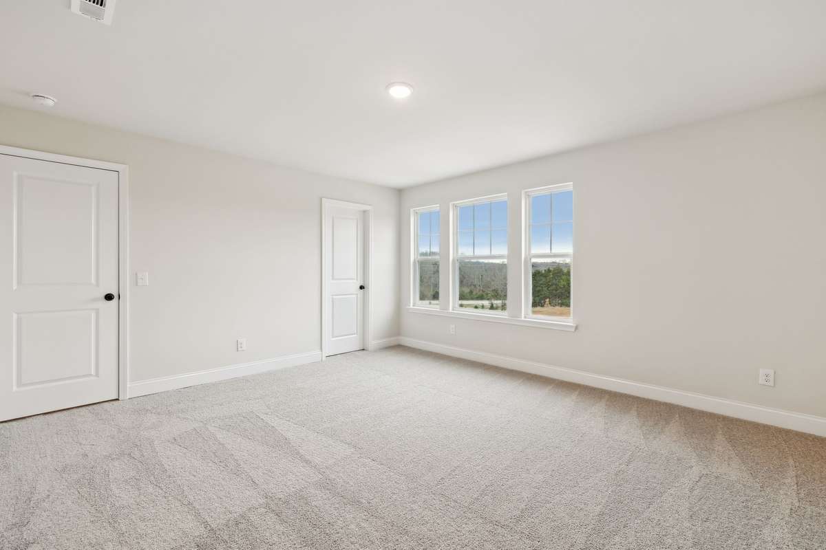 Bedroom #4 is big on space and possibilities! Whether it’s a cozy retreat, a study zone, or a creative hangout spot, there's plenty of room to make it your own. Complete with a spacious walk-in closet and a bright, welcoming vibe!