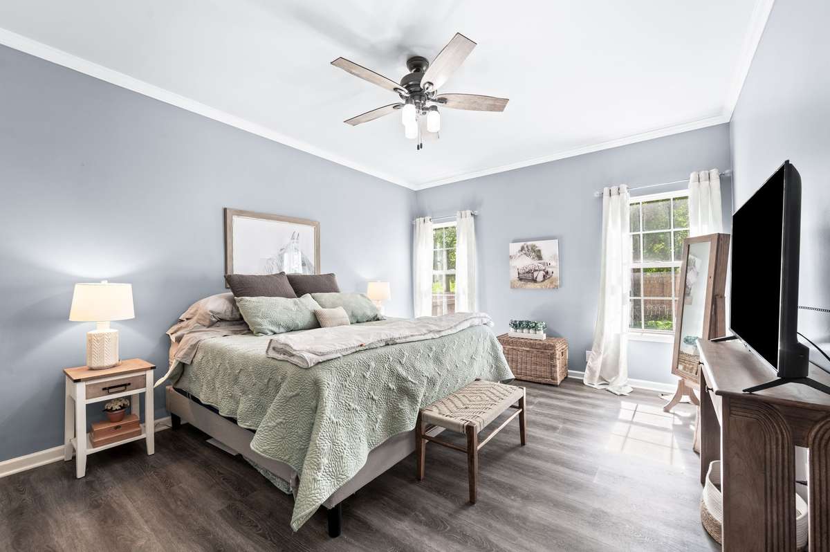 Spacious primary suite located on the main level.