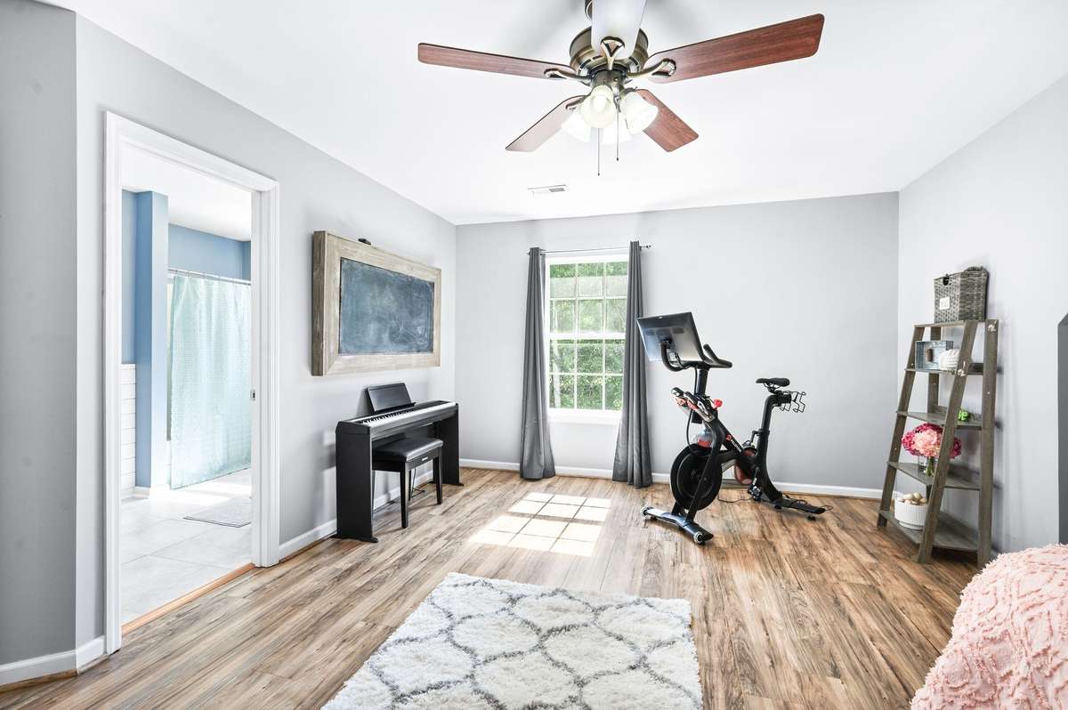 enter the upstairs bath from this bedroom; hallway entrance into bathroom as well.