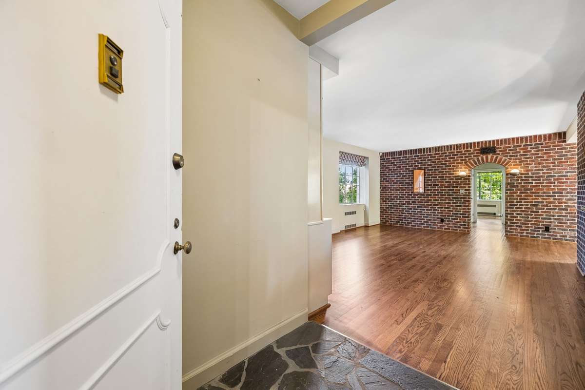 The uber cool brick walls are real brick to create a Manhattan loft style feel in the home.  This is not faux brick.