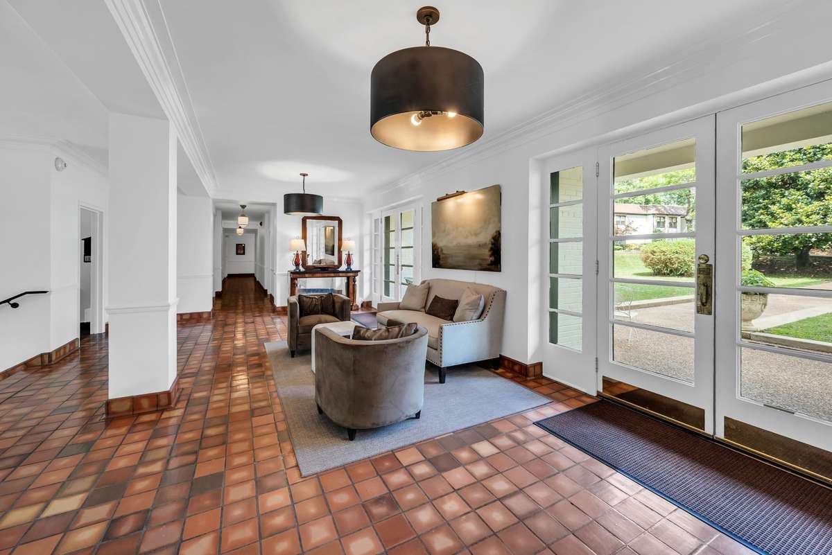 Royal Oaks Tower's lobby is classic and a lovely way to welcome your guests.  Large rear doors open to the back lawn and more parking.