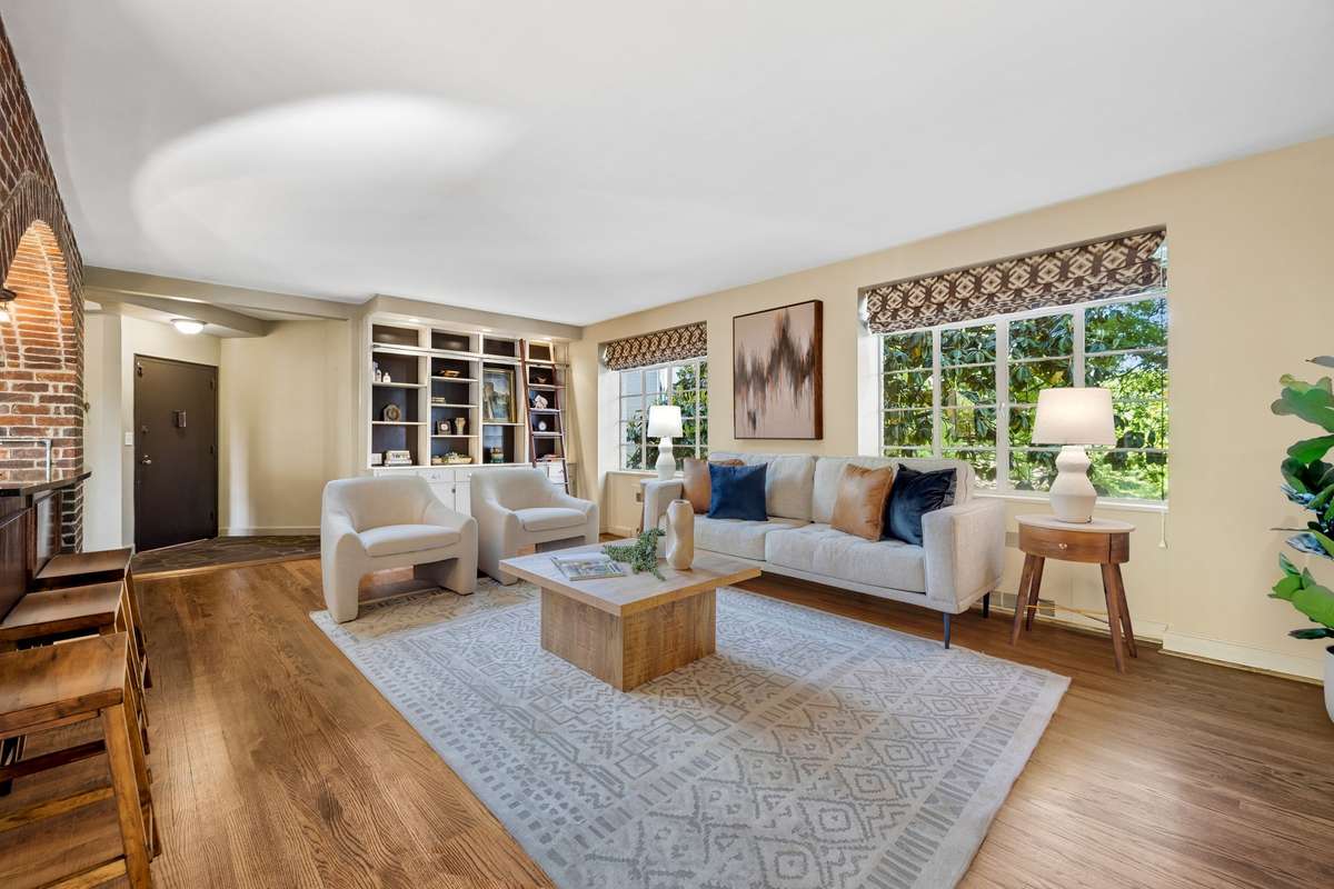 Walls of windows allow natural light to flow throughout the home.