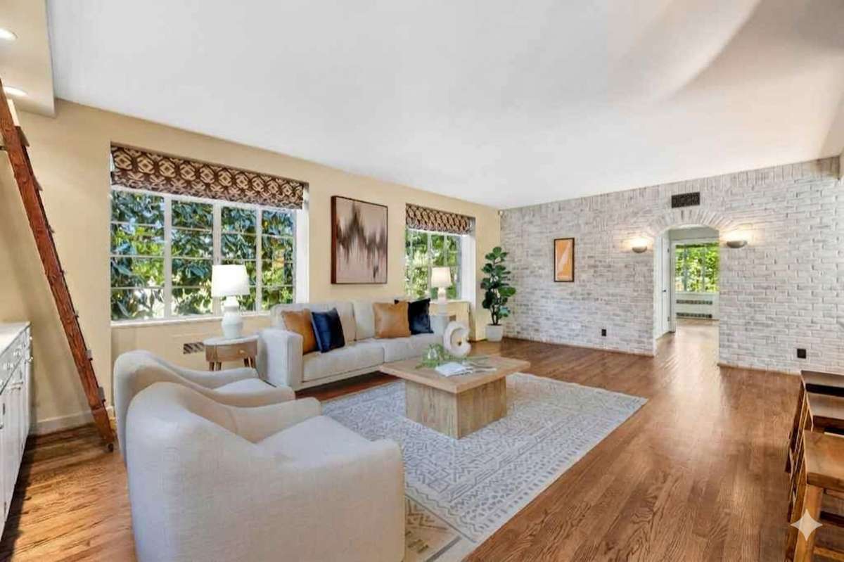 This rendering shows an adaptation of the brick interior walls if it was white washed to create a more feminine vibe.