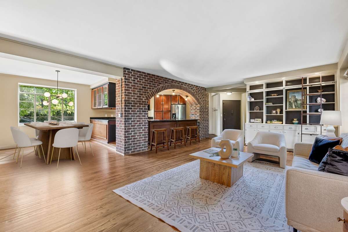 Wide open space makes this home live LARGE with great space for conversation and TV lounging!