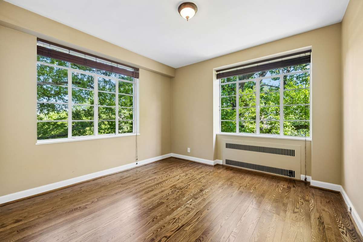 Second guest bedroom with great light and views.