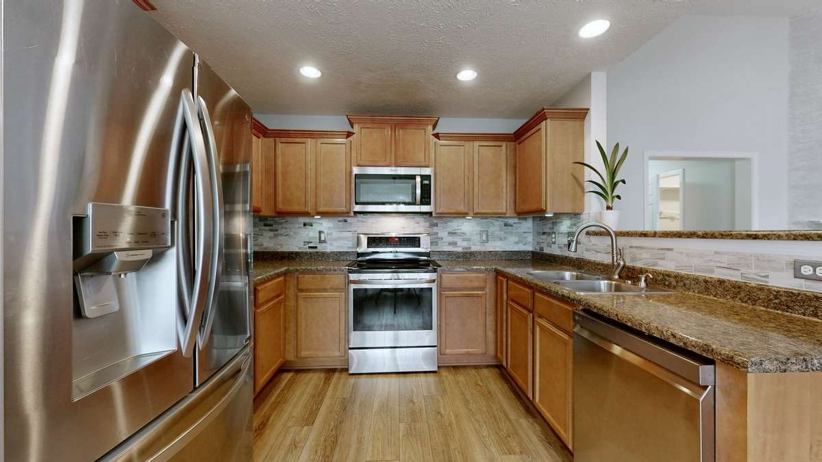 Beautiful Open Kitchen - 2 Refrigerators Remain - the one in the kitchen, and a 2nd one in the garage!