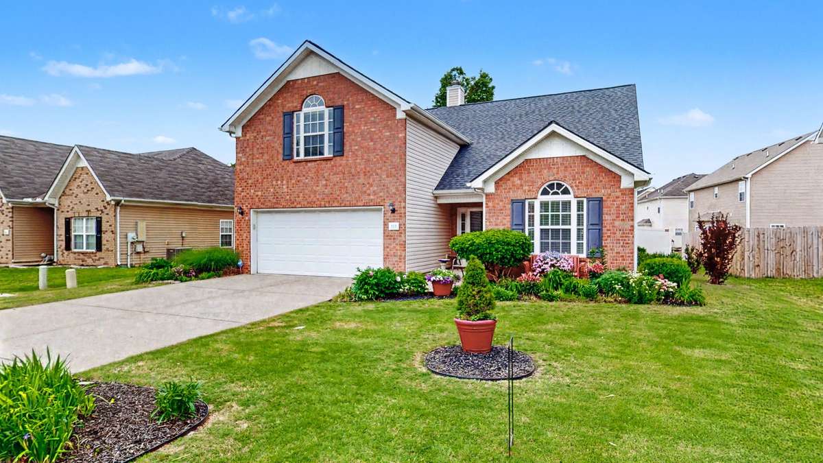 Thoughtfully Designed Landscaping Sets the Tone for This Home!