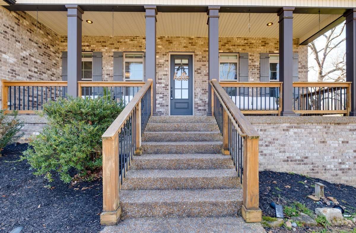ATTENTION to The Details....
ESTATE HEIGHT Front Door, Wide Steps + Porch Columns