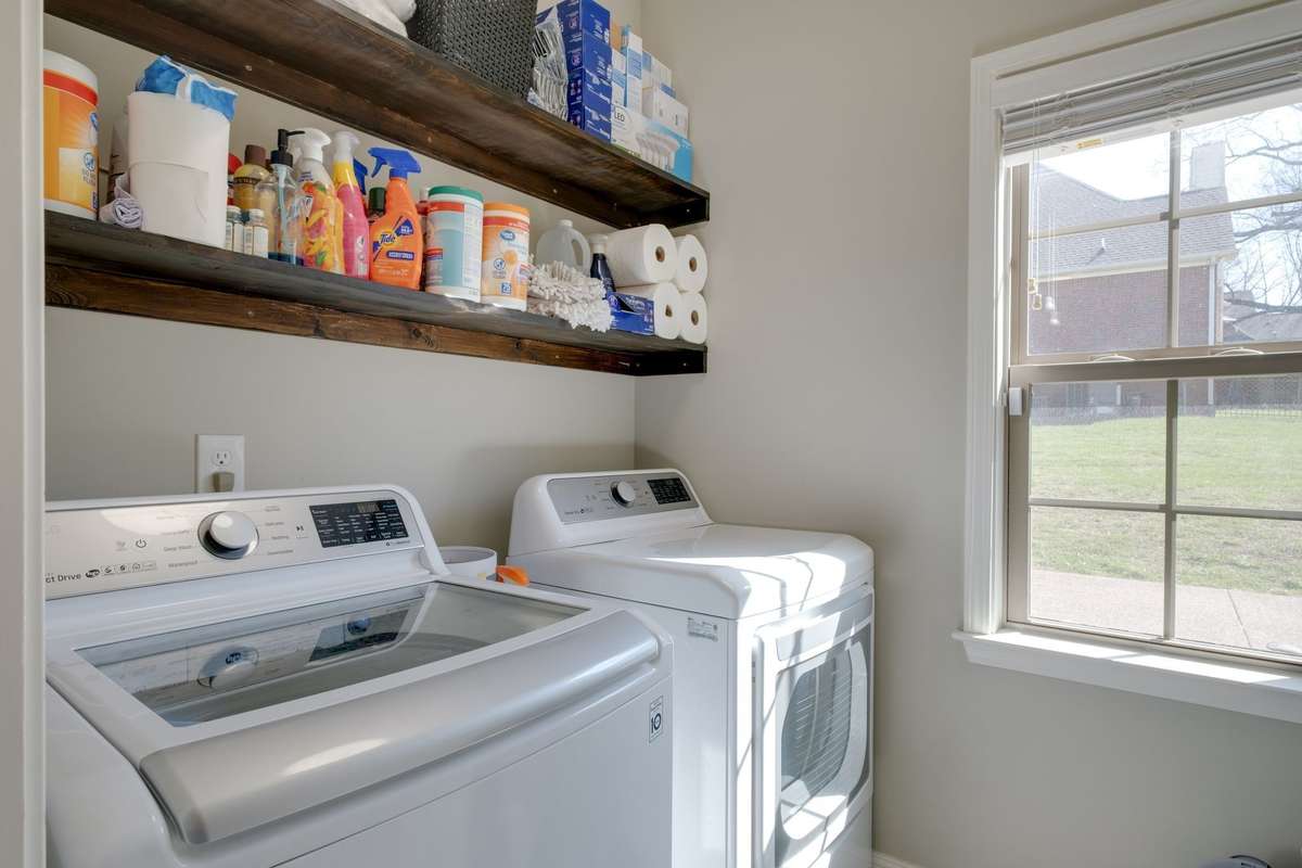 SPACIOUS Utilty Room w/ Tile Floor + Open Shelving