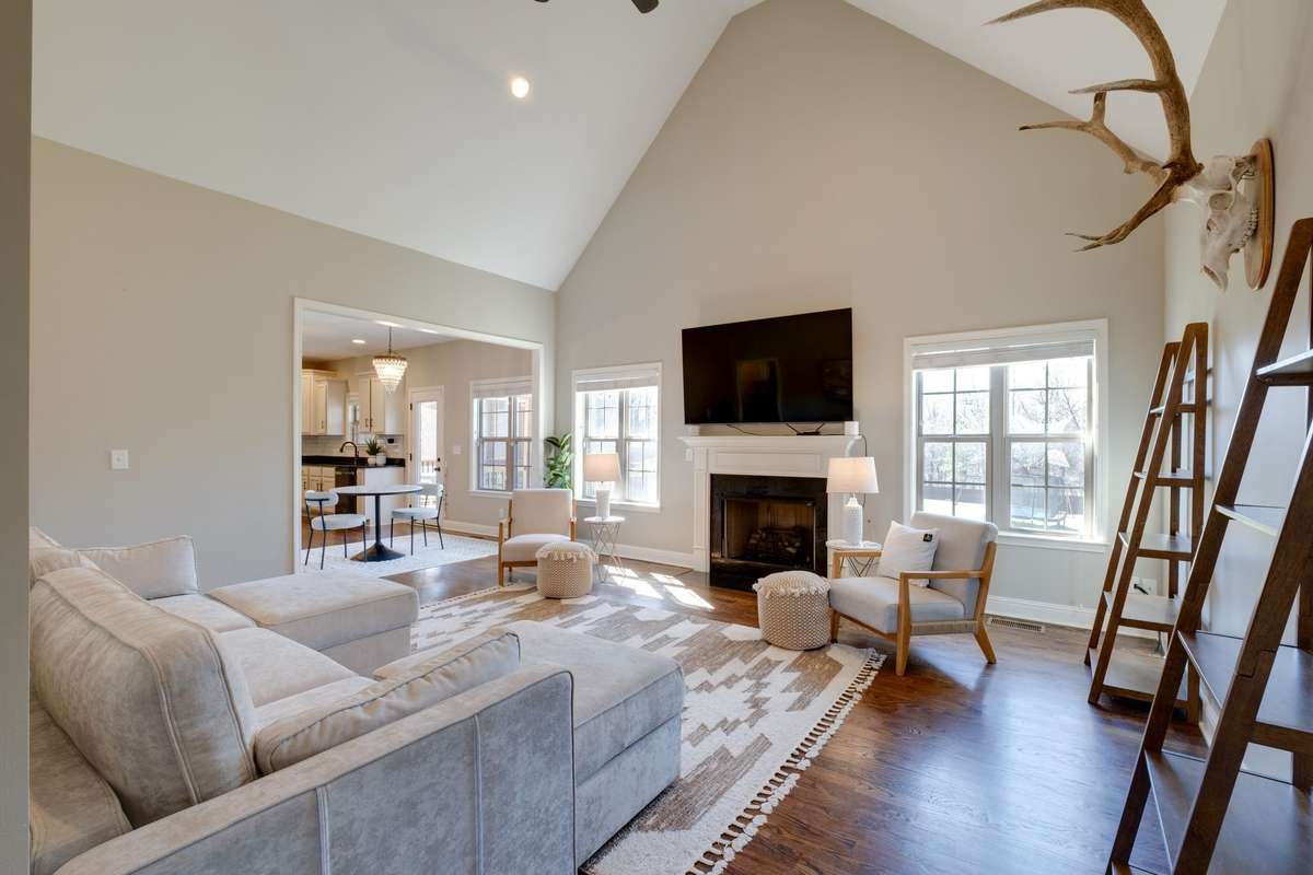 IMPRESSIVE Great Room w/ Cathedral Ceiling + Beautiful View of the Backyard
