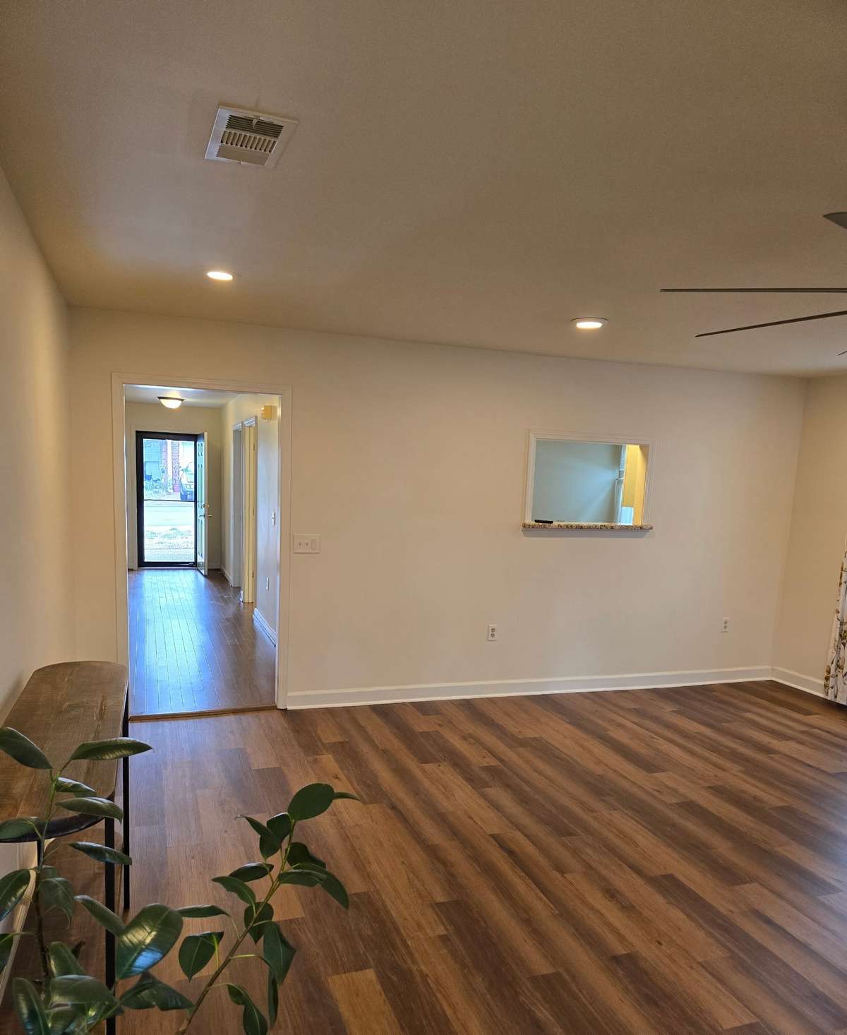 Living room looking into hall.
