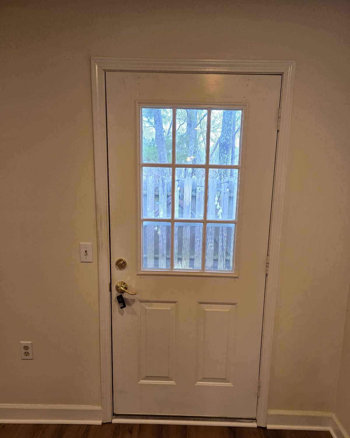 Living room door to privatebackyard patio.