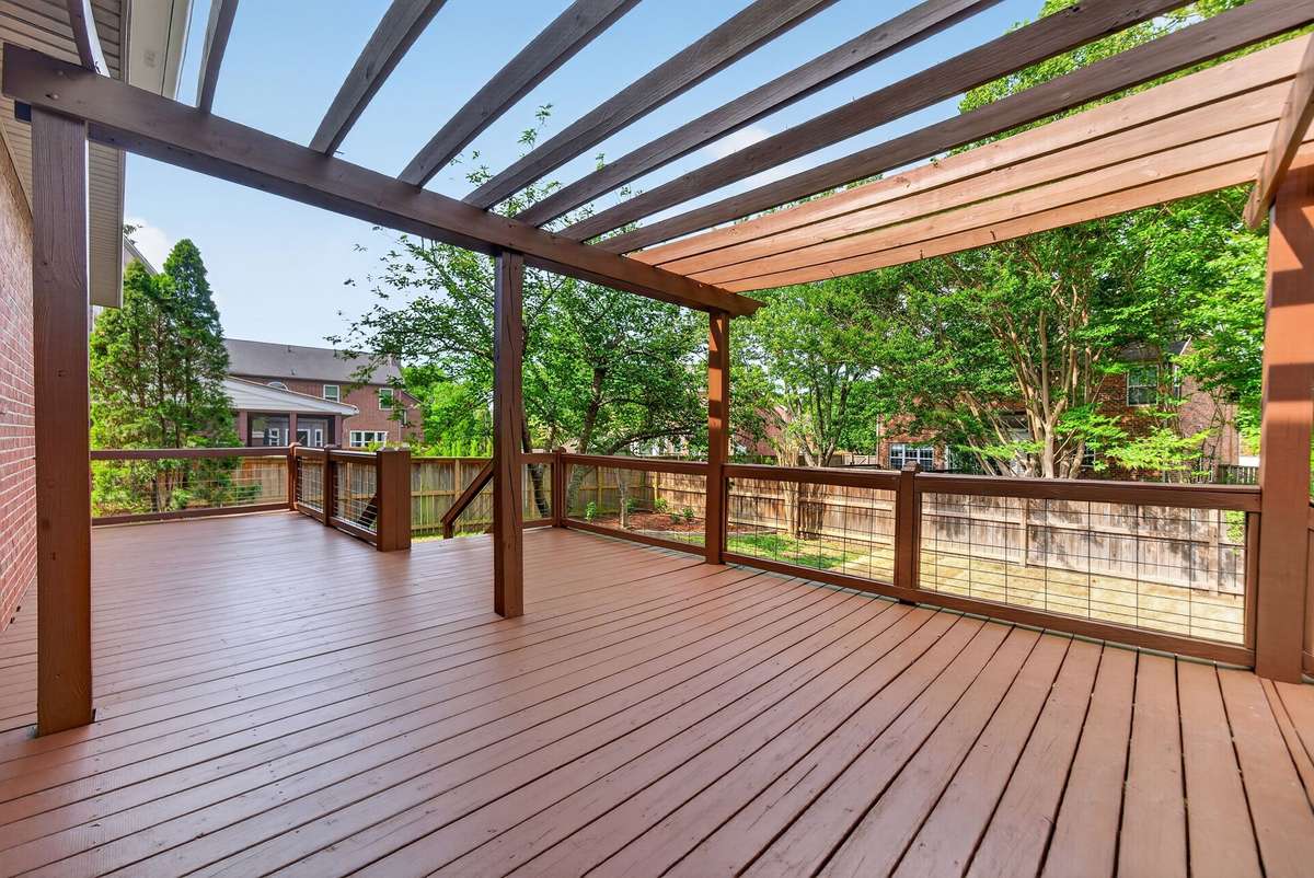 This deck is amazing!  Just painted.  It is large enough for multiple seating areas and is accessed off both the dining room and breakfast areas.