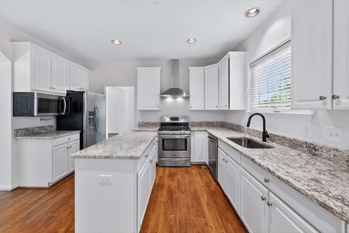 These are brand new granite counters installed last week.  The kitchen is fully applianced with stainless appliances.