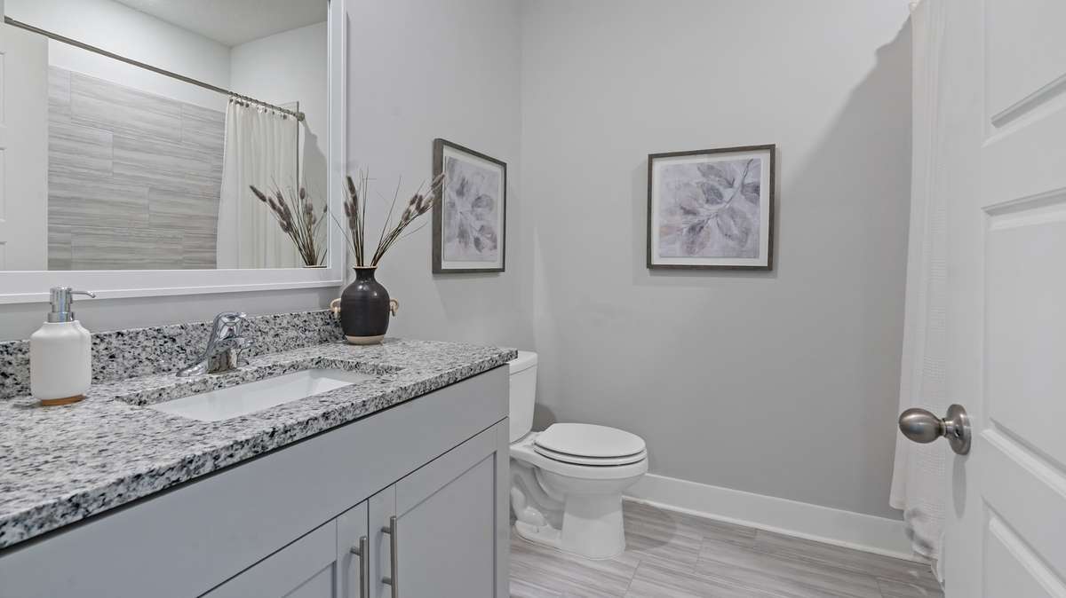 These pictures are of another Denham plan built in another area, not all features or finishes are the same.  Please call for the details for the finishes inside this new home.