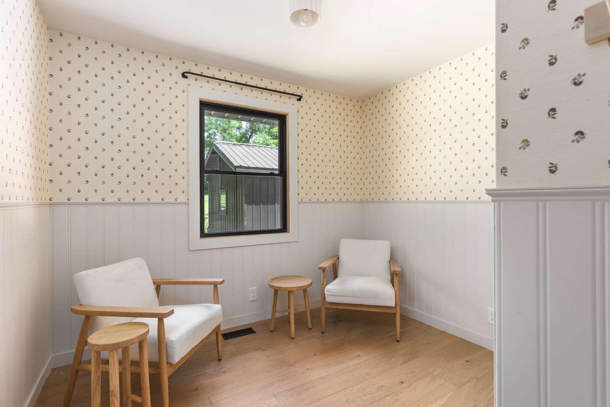 designer wallpaper and board and batten feature for this bedroom
