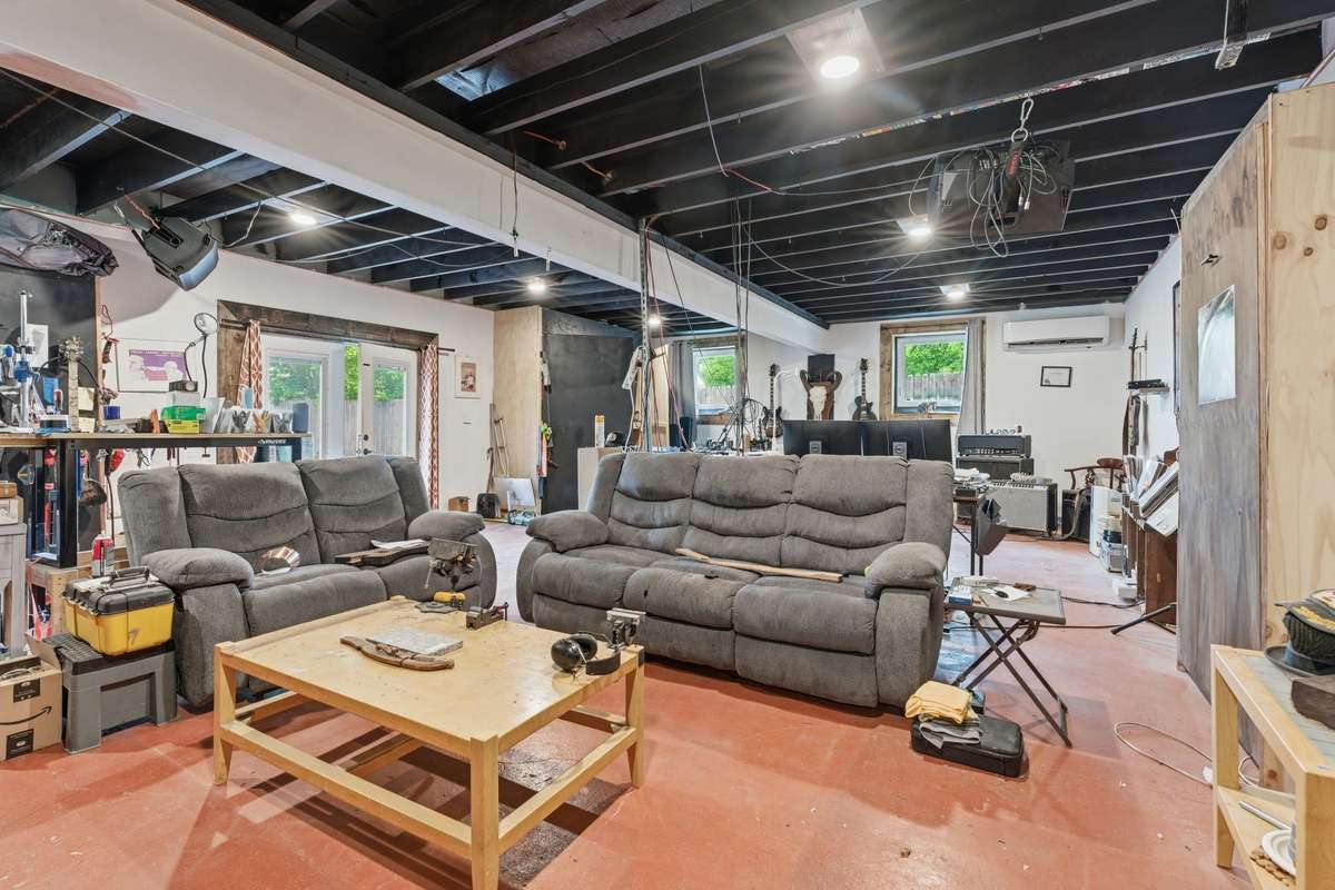 This space also has 2 Murphy Beds that can remain.