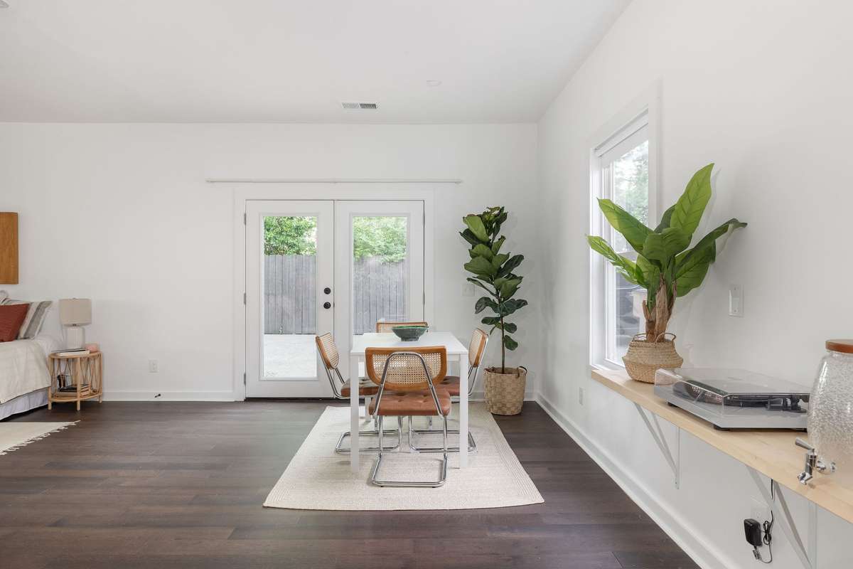 Enjoy the built in bar for your records, espresso machine, or desk