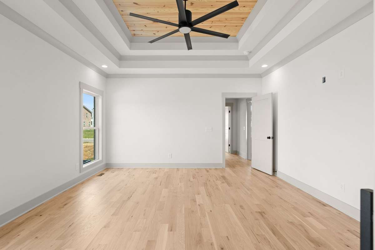 Another view of the primary bedroom.